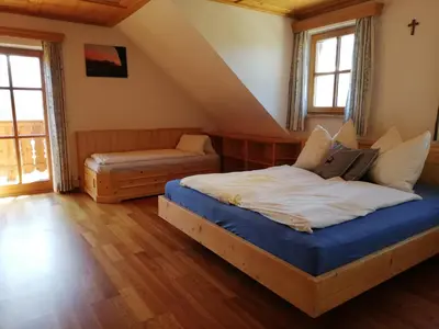 Ein Bett oder Betten in einem Zimmer der Unterkunft Paulbauer