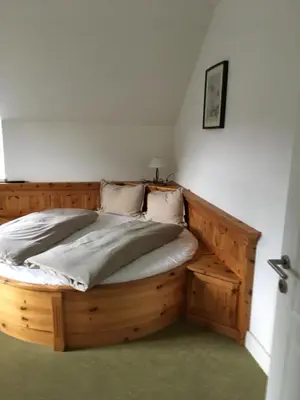 Ein Bett oder Betten in einem Zimmer der Unterkunft Landhaus Roidergütl