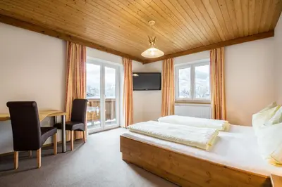 Ein Bett oder Betten in einem Zimmer der Unterkunft Haus Alpenland