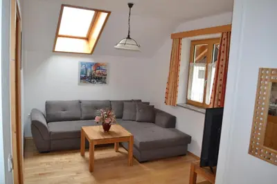 Ein Sitzbereich in der Unterkunft Ferienwohnung Zauner