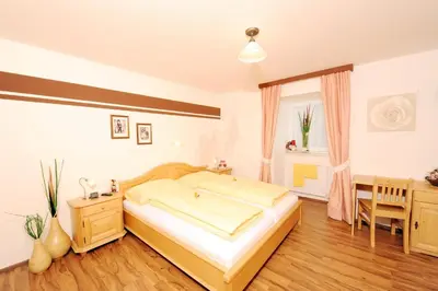Ein Bett oder Betten in einem Zimmer der Unterkunft Hotel-Restaurant Kirchenwirt Aigen