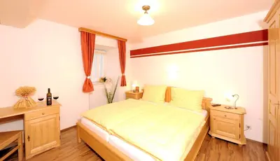 Ein Bett oder Betten in einem Zimmer der Unterkunft Hotel-Restaurant Kirchenwirt Aigen