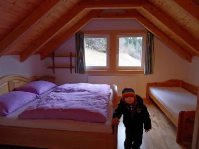 Ein Bett oder Betten in einem Zimmer der Unterkunft Ferienhaus Laberer by Schladmingurlaub