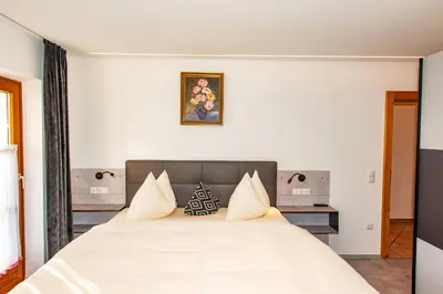 Ein Bett oder Betten in einem Zimmer der Unterkunft Ferienhaus Zentral