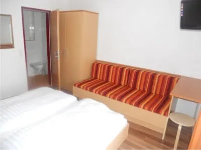 Ein Bett oder Betten in einem Zimmer der Unterkunft Haus Annemarie