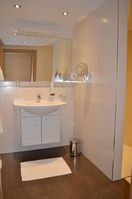 Ein Badezimmer in der Unterkunft Hotel Hemetsberger