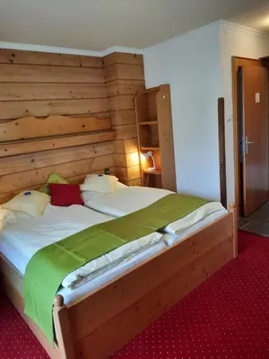 Ein Bett oder Betten in einem Zimmer der Unterkunft Landgasthof Hubertusstubn