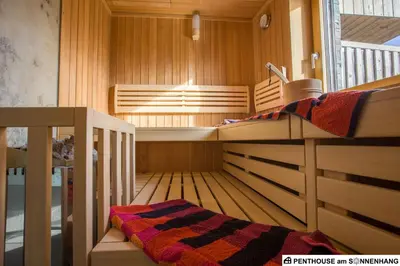 Ein Bett oder Betten in einem Zimmer der Unterkunft Penthouse am Sonnenhang mit exklusiver Ausstattung