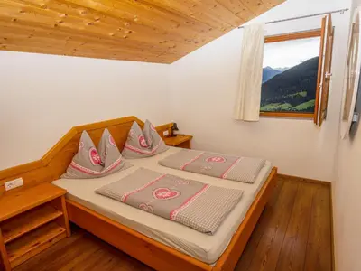Ein Bett oder Betten in einem Zimmer der Unterkunft Holiday Home Auer-2 by Interhome