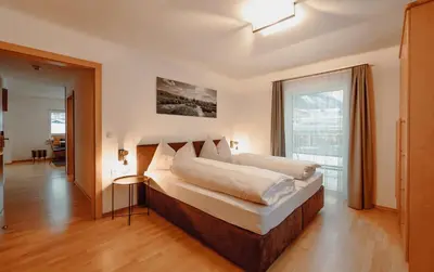 Ein Bett oder Betten in einem Zimmer der Unterkunft Stadlhof