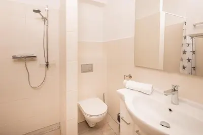 Ein Badezimmer in der Unterkunft Mentenwirt Pension&Appartements