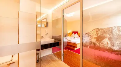 Ein Bett oder Betten in einem Zimmer der Unterkunft Panorama Hotel Traunstein