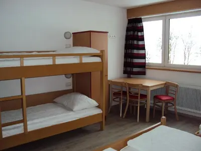 Ein Bett oder Betten in einem Zimmer der Unterkunft Jutel Obertraun