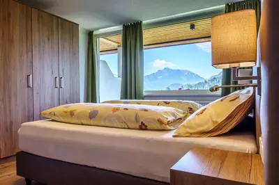 Ein Bett oder Betten in einem Zimmer der Unterkunft Haus Löger Apartments Pyhrn Priel