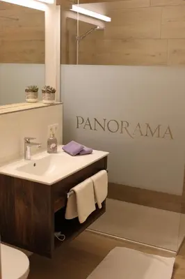 Ein Badezimmer in der Unterkunft Apartment Panorama