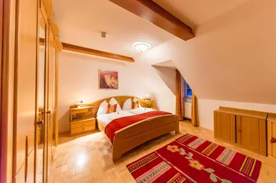 Ein Bett oder Betten in einem Zimmer der Unterkunft Landhotel Timmerer