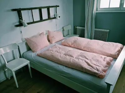 Ein Bett oder Betten in einem Zimmer der Unterkunft Pension Edelweiss Top 25 - Dachstein West