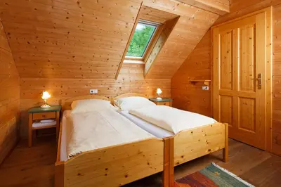Ein Bett oder Betten in einem Zimmer der Unterkunft ÖKO Feriendorf Schlierbach