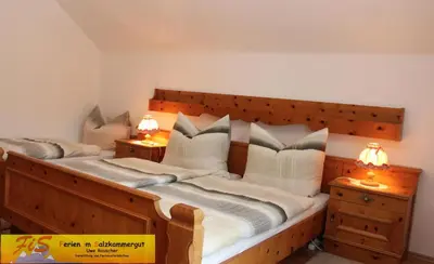 Ein Bett oder Betten in einem Zimmer der Unterkunft Haus Seeruhe - direkt am Grundlsee