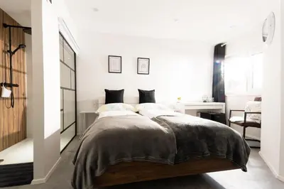 Ein Bett oder Betten in einem Zimmer der Unterkunft Wolfis Traunseeblick - mit kostenlosem Parkplatz direkt an der Unterkunft