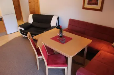 Ein Sitzbereich in der Unterkunft Appartments Hilton