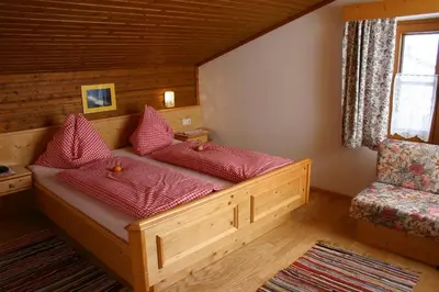 Ein Bett oder Betten in einem Zimmer der Unterkunft Berggasthof-Ferienbauernhof Habersatt