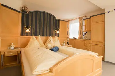 Ein Bett oder Betten in einem Zimmer der Unterkunft Pension Firn Sepp