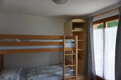 Ein Bett oder Betten in einem Zimmer der Unterkunft Chalet Katrin