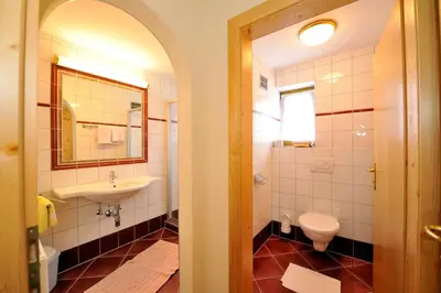 Ein Badezimmer in der Unterkunft Hotel-Restaurant Schwaiger***
