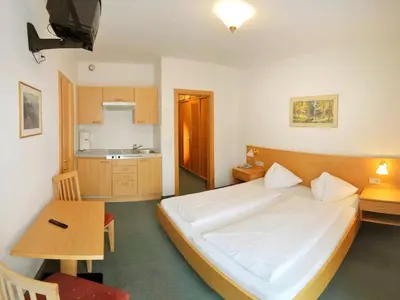 Ein Bett oder Betten in einem Zimmer der Unterkunft Appartement Resort Hanneshof