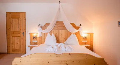 Ein Bett oder Betten in einem Zimmer der Unterkunft Bio-Bauernhof Simonbauer