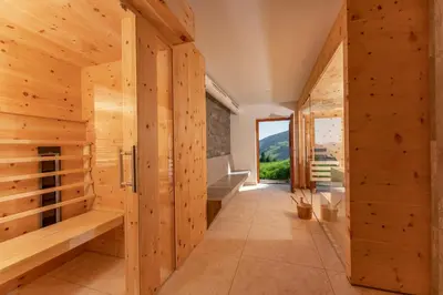 Ein Bett oder Betten in einem Zimmer der Unterkunft Hotel Garni Hochwurzen