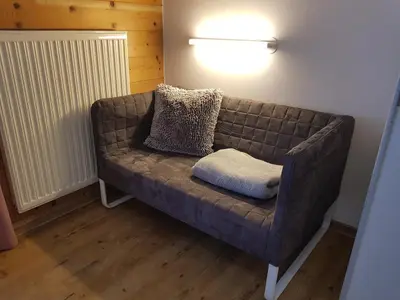 Ein Sitzbereich in der Unterkunft Appartement Mühlebnerhof