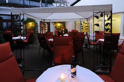 Ein Restaurant oder anderes Speiselokal in der Unterkunft Pension Sendlhofer