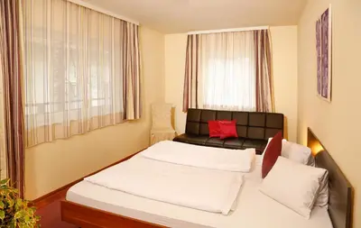 Ein Bett oder Betten in einem Zimmer der Unterkunft Pension Sendlhofer