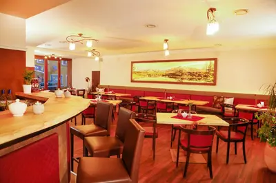 Ein Restaurant oder anderes Speiselokal in der Unterkunft Pension Sendlhofer