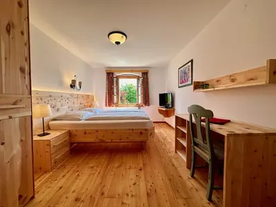 Ein Bett oder Betten in einem Zimmer der Unterkunft Lexenhof