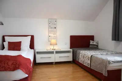 Ein Bett oder Betten in einem Zimmer der Unterkunft Apartment Loindl