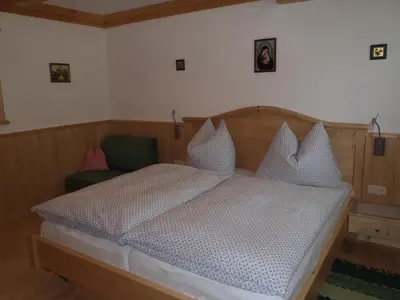 Ein Bett oder Betten in einem Zimmer der Unterkunft Russbachbauer