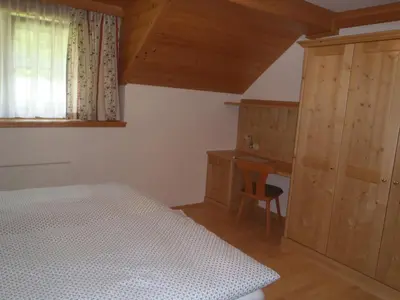 Ein Bett oder Betten in einem Zimmer der Unterkunft Russbachbauer