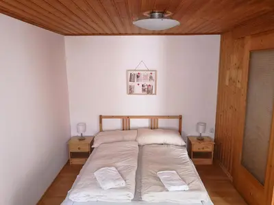 Ein Bett oder Betten in einem Zimmer der Unterkunft Haus Senna