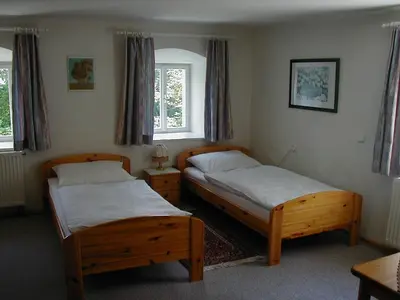Ein Bett oder Betten in einem Zimmer der Unterkunft Ferienhaus-Loidl