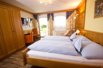 Ein Bett oder Betten in einem Zimmer der Unterkunft Gästehaus Stabauer