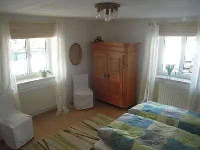 Ein Bett oder Betten in einem Zimmer der Unterkunft Ferienwohnung Oswald Fuschlsee