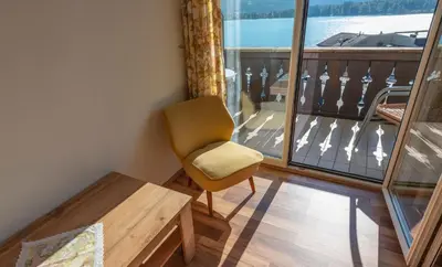 Ein Sitzbereich in der Unterkunft Aberseeblick Pension Ellmauer