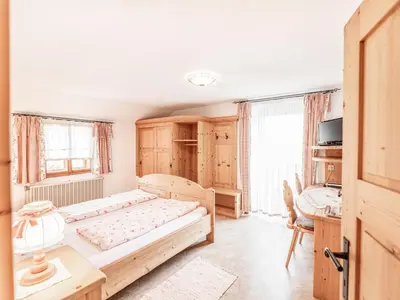 Ein Bett oder Betten in einem Zimmer der Unterkunft Urlaub am Bauernhof Feldbauer