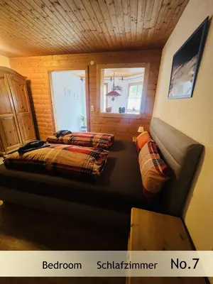 Ein Bett oder Betten in einem Zimmer der Unterkunft Gerhards Landhaus