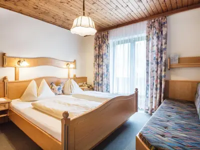 Ein Bett oder Betten in einem Zimmer der Unterkunft Apartment in Kleinarl near Ski Lift