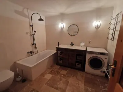 Ein Badezimmer in der Unterkunft Bruggerhaus