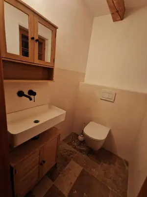 Ein Badezimmer in der Unterkunft Bruggerhaus